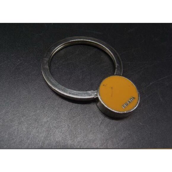 Prada Silver Metal Round Keyring Mustard Yellow Logo Medallion Key Chain - Picture 1 of 6